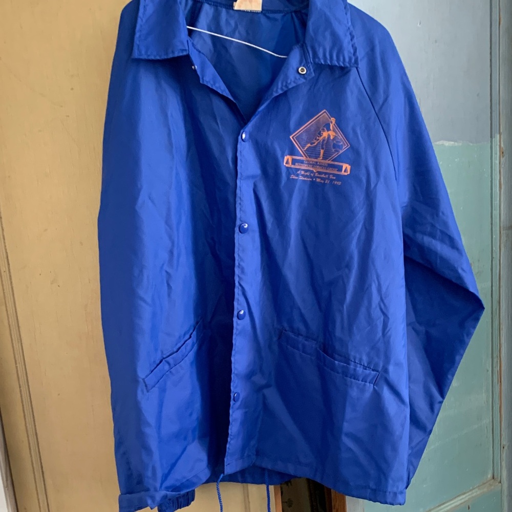 Blue Windbreaker Jacket with Orange Logo